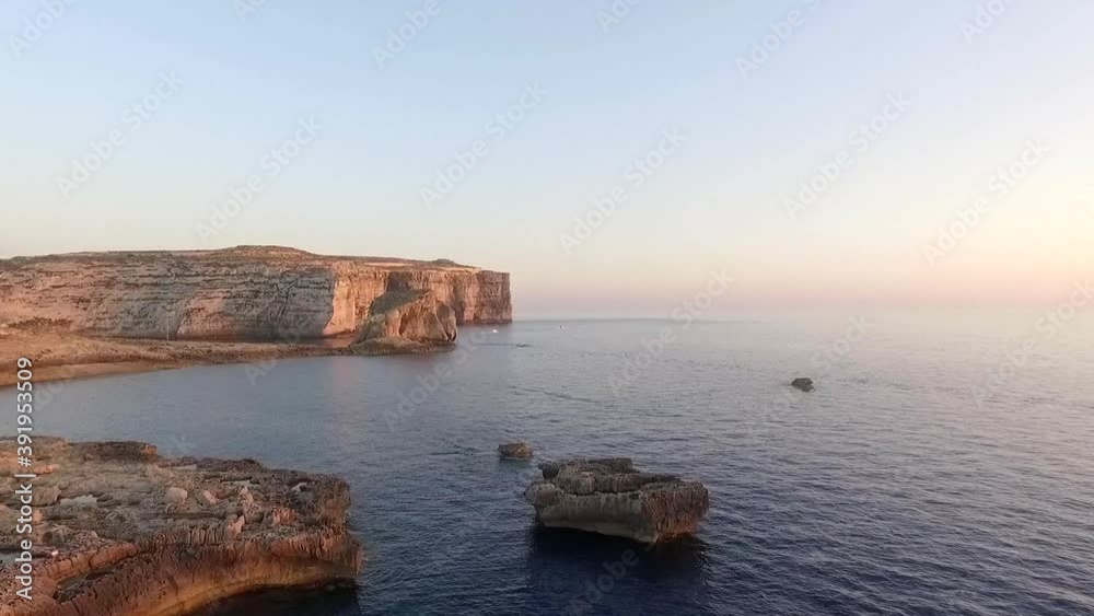 AERIAL: Dron shot in sunset from Gozo, Malta AERIAL: Dron shot in sunset from Gozo, Malta