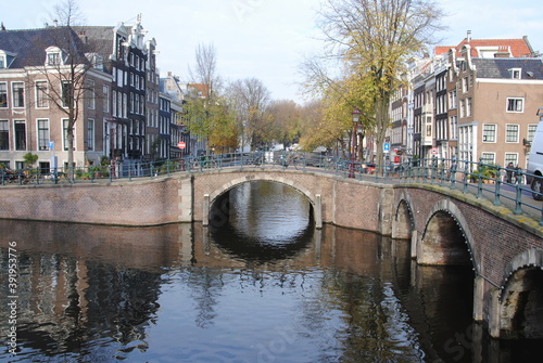 Intersection of two canals, the prinsengracht and the Reguliersgracht, in the center of Amsterdam photo