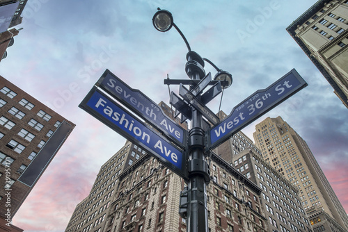 Manhattan street signs, road intersection in New York City, upward view © jovannig