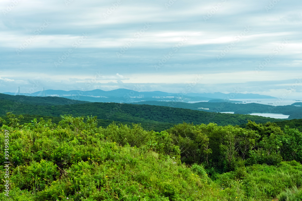 Beautiful landscape, Far East, Primorsky Krai, Vladivostok, Russia. Hills and sea of Japan on the distance. Beautiful landscape, Far East, Primorsky Krai, Vladivostok, Russia. Hills and sea of Japan on the distance.