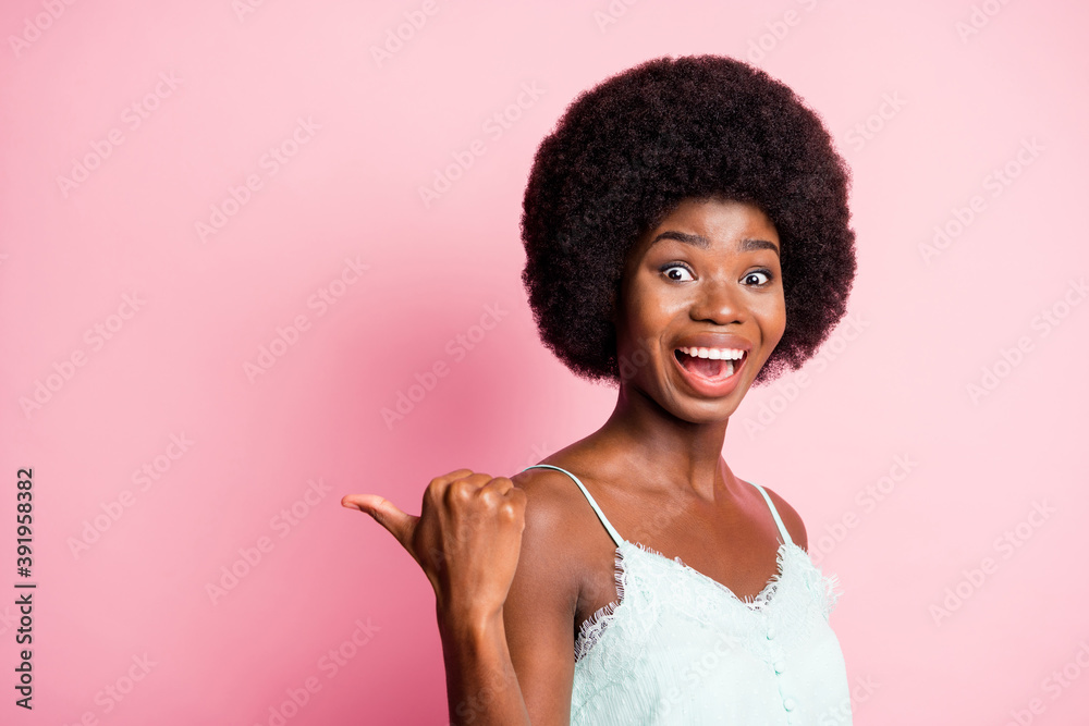 Close up portrait of wavy hairstyle lady direct thumb empty space promo open mouth isolated on pink color background Close up portrait of wavy hairstyle lady direct thumb empty space promo open mouth isolated on pink color background