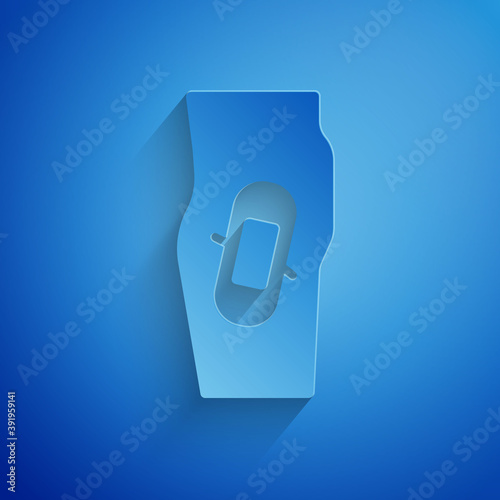 Paper cut Plaster on leg icon isolated on blue background. Paper art style. Vector.