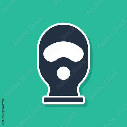 Blue Balaclava icon isolated on green background. A piece of clothing for winter sports or a mask for a criminal or a thief. Vector.