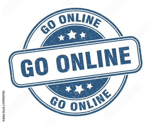 go online stamp. go online label. round grunge sign