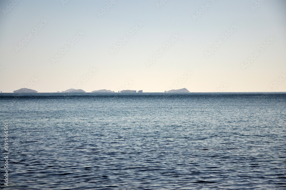 Beautiful seascape with hills on the horizon. Sea of Japan, Primorsky Krai, Russia. Beautiful seascape with hills on the horizon. Sea of Japan, Primorsky Krai, Russia.