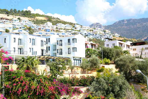 View of white houses in Kalkan city Turkey. photo
