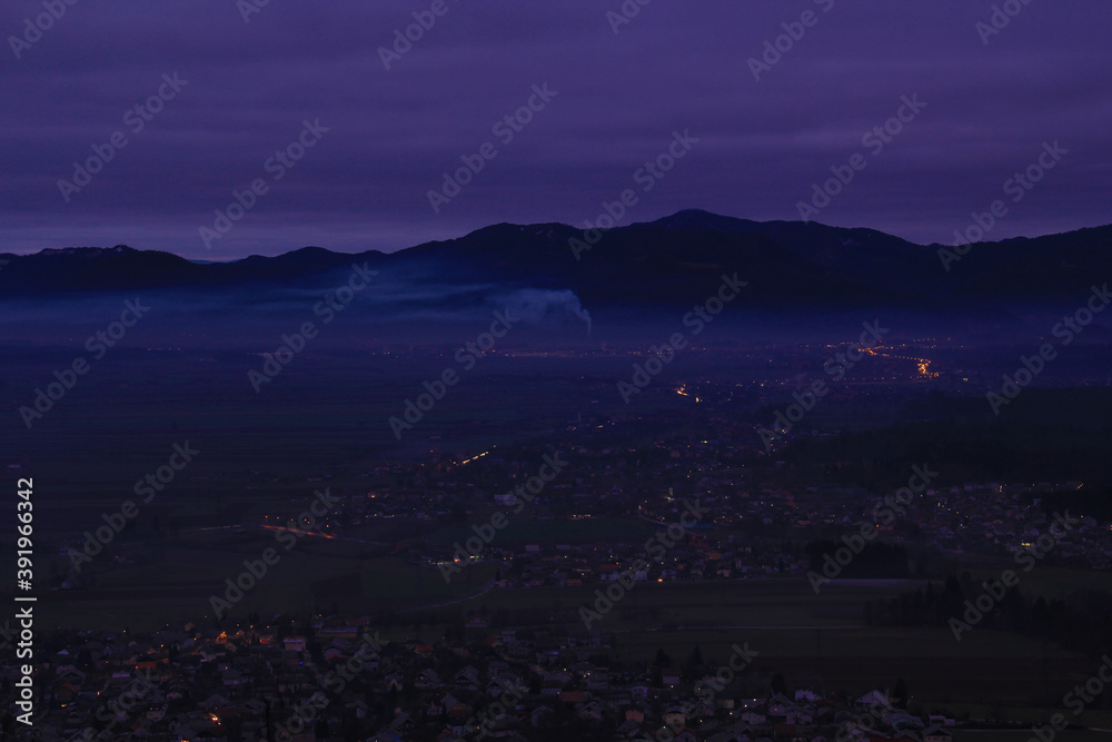 Panorama of city at night, sky, towers, lights, valley, smoke and smog. Panorama of city at night, sky, towers, lights, valley, smoke and smog.