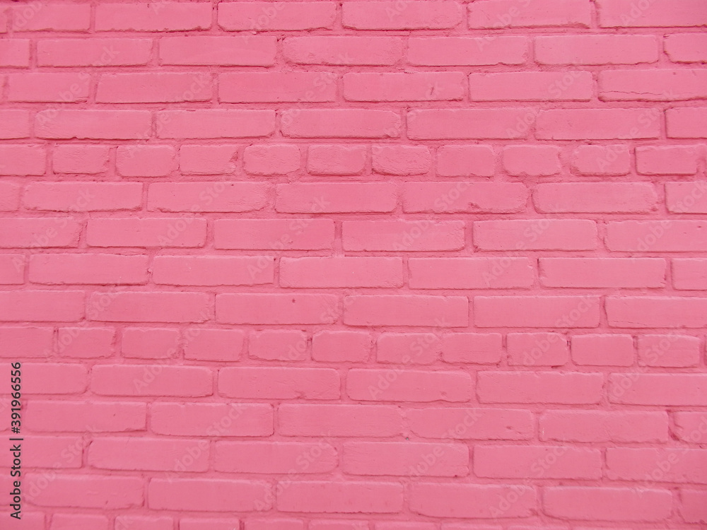 Fototapeta premium Pink brick wall as background, texture.