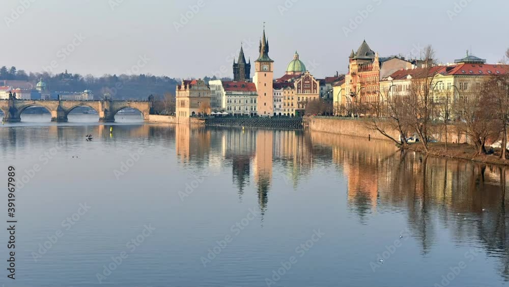 Castle with reflection in river, Prague city