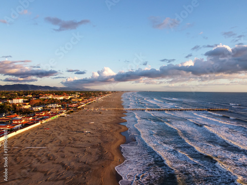 Vista aerea della spiaggia e del Pontile di Forte dei Marmi, in una giornata d'autunno. photo