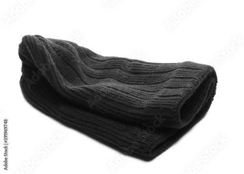 Black folded woolen hat for winter isolated on white background, head wear