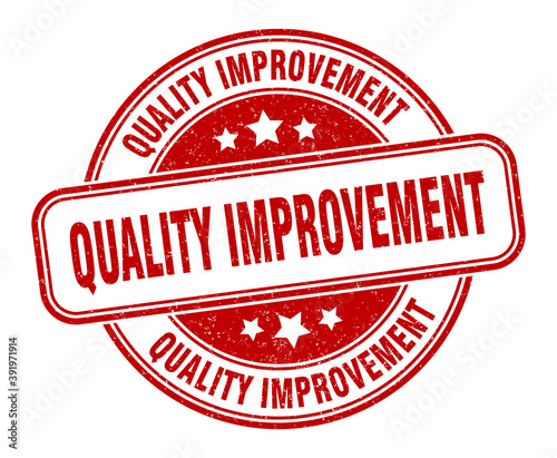 quality improvement stamp. quality improvement label. round grunge sign