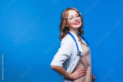 Fotografija Doctor woman medical portrait isolated blue background.