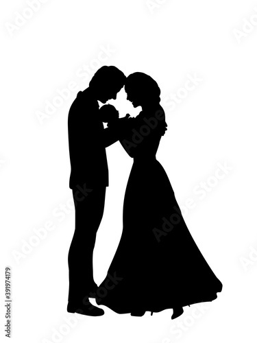 Silhouettes happy parents father and mother holding newborn baby