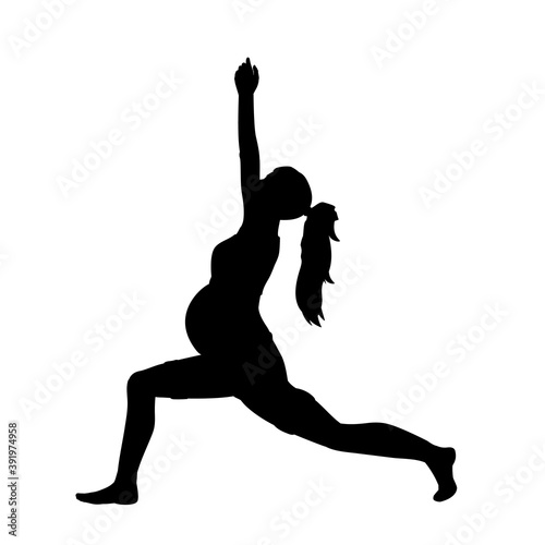 Silhouette of pregnant woman doing sports