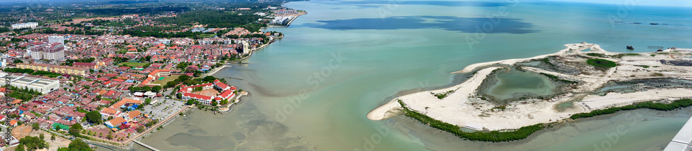 MALACCA, MALAYSIA - DECEMBER 29, 2019: Aerial view of city skyline on a beautiful sunny day, panoramic view