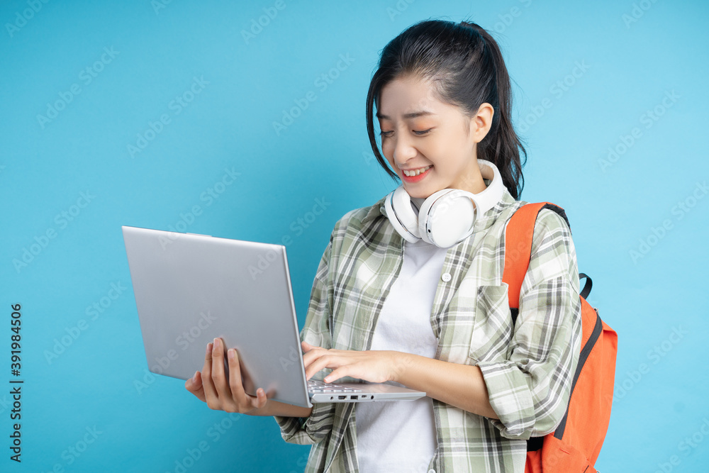 students holding computers determined to study students holding computers determined to study