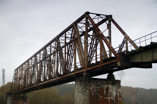 Old steel riveted and forgotten bridge © Skórzewiak