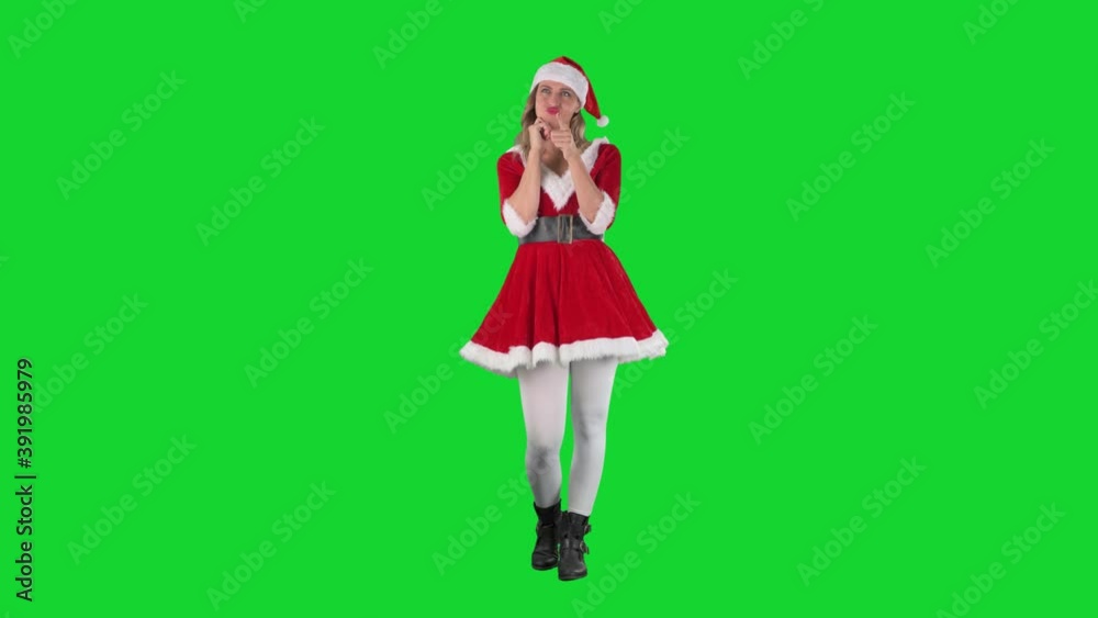 Undecided young Santa girl waiting with hesitance then disapproving and rejecting. Full body on chroma key green screen. Undecided young Santa girl waiting with hesitance then disapproving and rejecting. Full body on chroma key green screen.