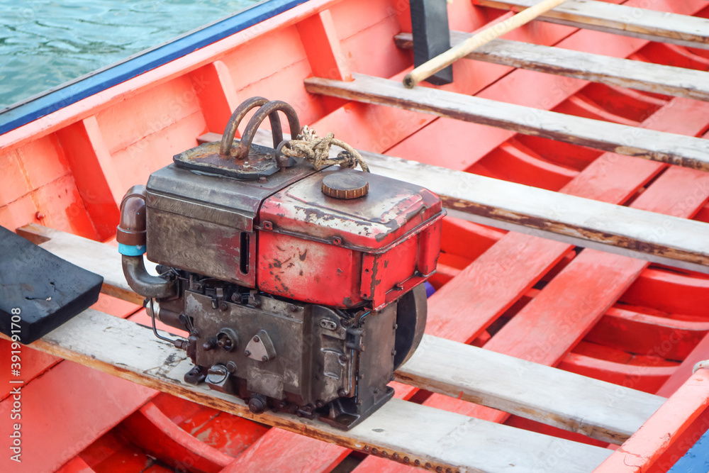 Boat diesel engines on long tail boats waiting for repairs