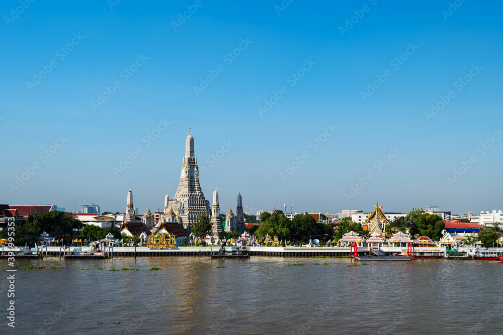 Wat Arun Temple and Chao Phraya river with sky in Bangkok, Thailand