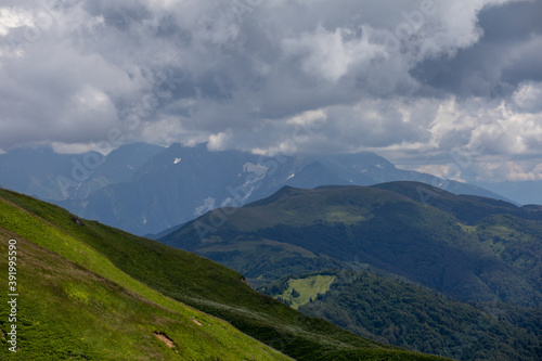 Beautiful summer views of blooming alpine meadows of Caucasus mountains © Sergei Malkov