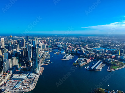 Panoramic Aerial views of Sydney Harbour with the bridge, CBD, North Sydney, Barangaroo, Lavender Bay and boats in view © Elias Bitar