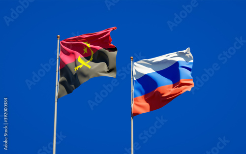 Beautiful national state flags of Russia and Angola.