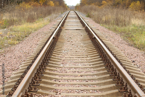  Autumn background - the railway tracks recede over the horizon.