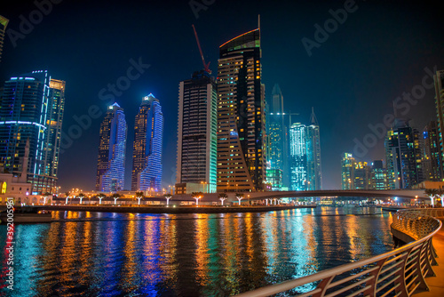 DUBAI  UAE - DECEMBER 6  2016  Dubai Marina at night. city promenade. Skyscrapers along the canals