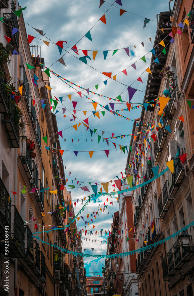 Fototapeta premium Walk through the colorful streets of Lavapies, the most popular neighborhood in Madrid