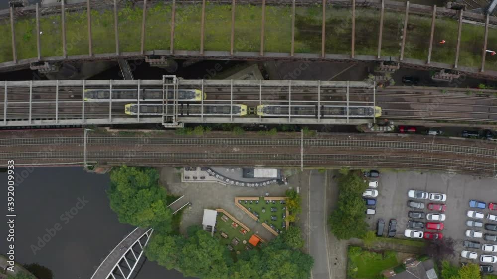 Overhead Drone Shot Tracking Train Travelling Through Castlefield Canals 04 Overhead Drone Shot Tracking Train Travelling Through Castlefield Canals 04