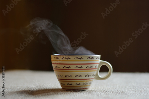 smoke over a cup of coffee