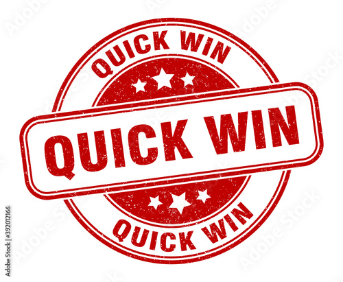 quick win stamp. quick win label. round grunge sign