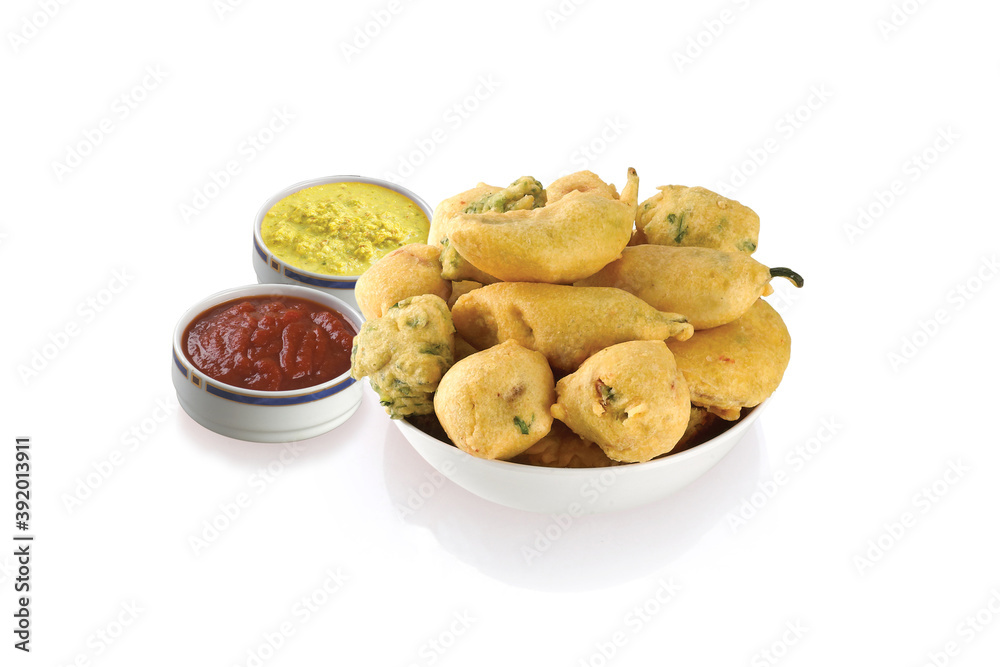 Indian Street Fried Food Pakora Also Know as Pakoda, Bhajiya, Bhajia, Methi Gota, Kanda Bhaji, Pyaz Pakoda, Fried Chillies, Onion Wada, potato vada, aloo Bhaji or fritter, Served with Chutney. Indian Street Fried Food Pakora Also Know as Pakoda, Bhajiya, Bhajia, Methi Gota, Kanda Bhaji, Pyaz Pakoda, Fried Chillies, Onion Wada, potato vada, aloo Bhaji or fritter, Served with Chutney.