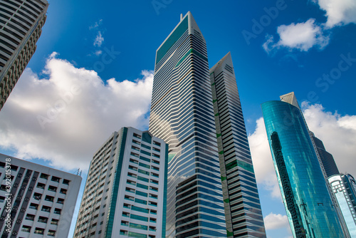 DUBAI  UAE - DECEMBER 10  2016  Downtown city skyscrapers on a beautiful sunny day