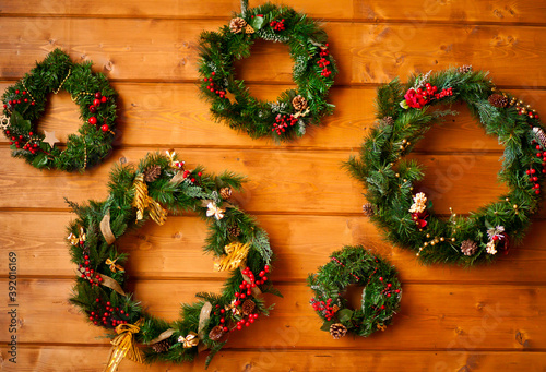 Christmas five wreaths on the wooden background
