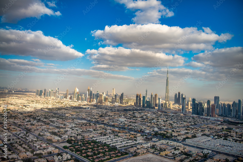Obraz premium DUBAI, UAE - DECEMBER 10, 2016: Aerial view of Downtown Dubai from helicopter at sunset