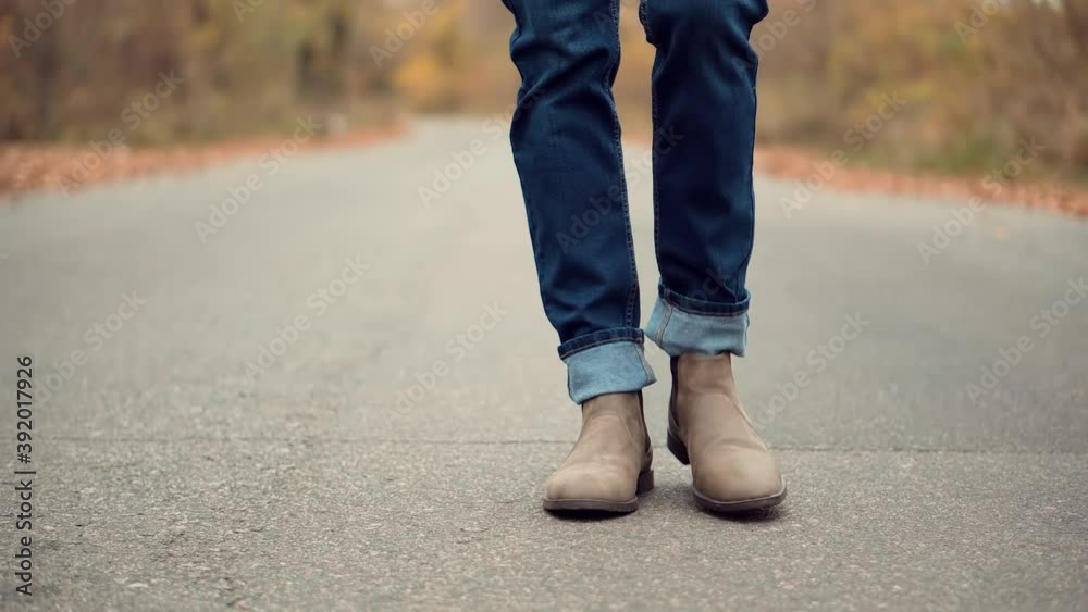 Confidence Man Feet Walking On Road.Lonely Handsome Guy Rest On Holiday.Man Legs In Chelsea Boot Walking On Park.Businessman Legs On Sneakers Relaxing At Fall.Male In Leather Shoes Walk Autumn Road. Confidence Man Feet Walking On Road.Lonely Handsome Guy Rest On Holiday.Man Legs In Chelsea Boot Walking On Park.Businessman Legs On Sneakers Relaxing At Fall.Male In Leather Shoes Walk Autumn Road.