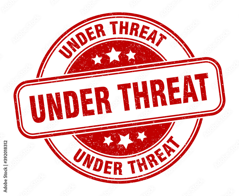 under threat stamp. under threat label. round grunge sign under threat stamp. under threat label. round grunge sign