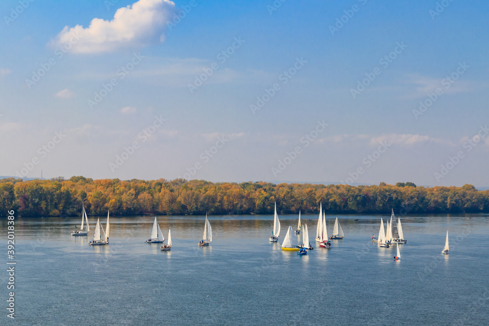 Obraz premium Yachts at sailing regatta on the Dnieper river in Kremenchug, Ukraine