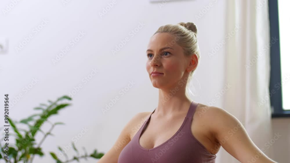 sport, fitness and people concept - happy pregnant woman doing yoga on mat at home sport, fitness and people concept - happy pregnant woman doing yoga on mat at home