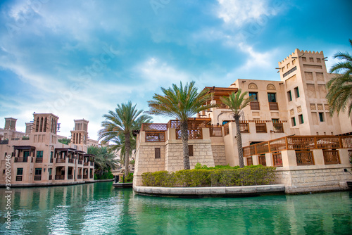 View of Madinat Jumeirah old style buildings from the canals, Dubai, UAE