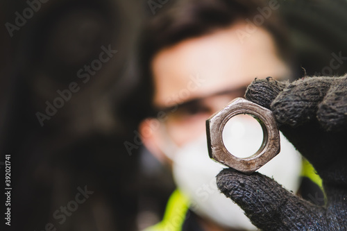 The quality checks of the manufactured metal part.