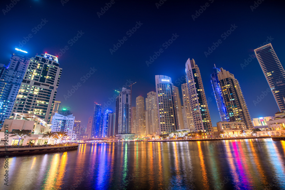 DUBAI, UAE - DECEMBER 10, 2016: Skyscrapers in Dubai Marina at night, UAE