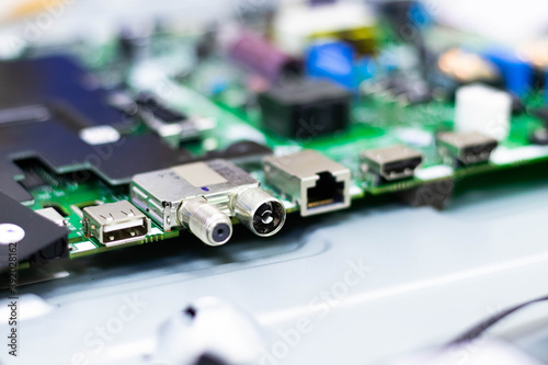 Electronic components. Focus in the enthernet connector. Blur background. Electronic circuit board close up.