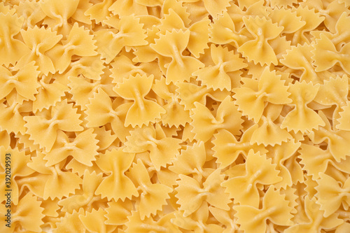 some farfalle pasta forming a background pattern
