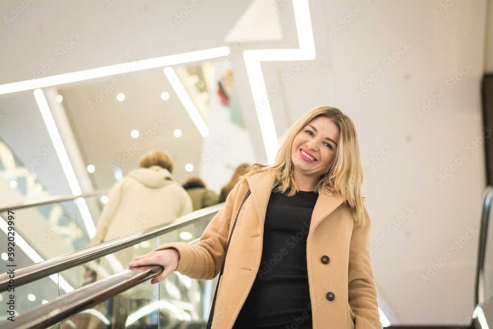 Business woman in a long autumn coat Business woman in a long autumn coat