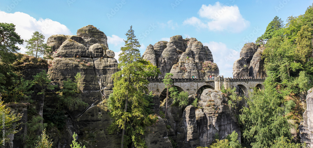 Panorama of the Bastei Bridge in Saxon Switzerland NationL Park in Germany on a sunny day Panorama of the Bastei Bridge in Saxon Switzerland NationL Park in Germany on a sunny day