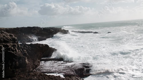 waves breaking on the rocks